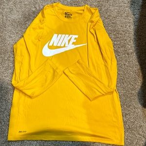 yellow nike shirt